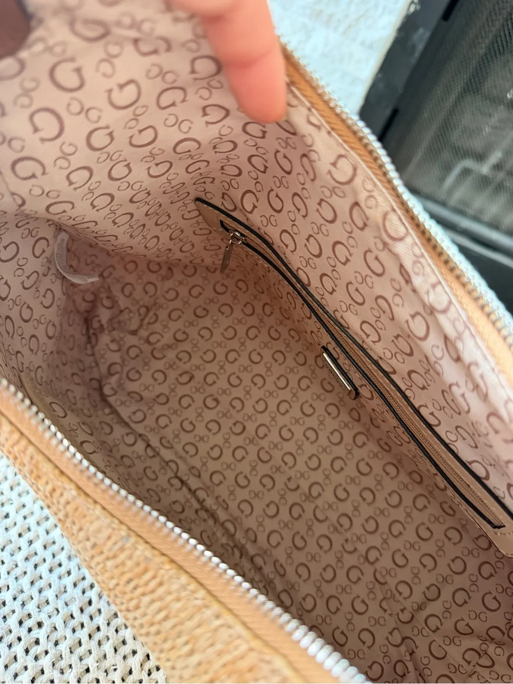 Guess prominent attached pouch